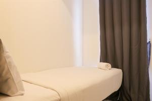 Warm and Cozy 2BR Tokyo Riverside PIK 2 Apartment By Travelio