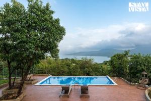 StayVista at La Sierra with Pawna Lake View, WiFi