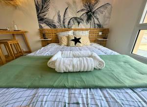 Appartements Oasis - Wifi, Clim, Vue, Equipe : photos des chambres