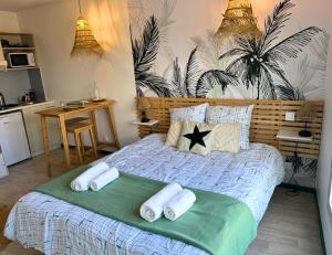Appartements Oasis - Wifi, Clim, Vue, Equipe : photos des chambres