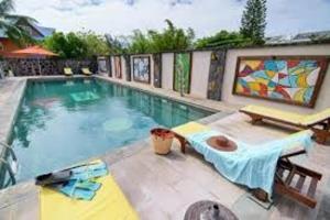 Modern Apartment in Grand Baie, sea view, shared pool.