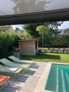 Maisons de vacances Maison elegante a Bouc-Bel-Air avec piscine privee : photos des chambres