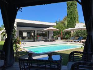 Maisons de vacances Maison elegante a Bouc-Bel-Air avec piscine privee : photos des chambres