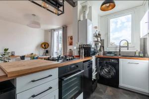 Appartements Le Loft de l-Artiste : photos des chambres
