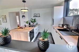 Maisons de vacances The black house : photos des chambres