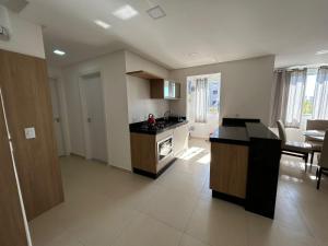 082 - Apto confortável na praia de Bombas