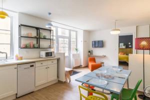 Appartements En plein coeur d-Arromanches - Cote Digue : photos des chambres