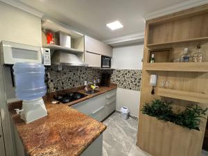 575 - Apto 3 dormitórios a 250m da praia de Bombas