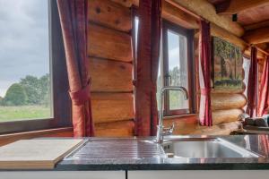 Cozy 4-Bedroom Chalet with Outdoor Spa in Zottegem