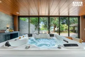 StayVista at Enclave of Bliss with Jacuzzi & BBQ Grill - Junnar