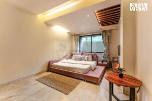 StayVista at Enclave of Bliss with Jacuzzi & BBQ Grill