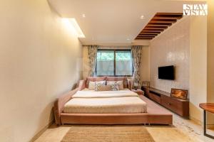 StayVista at Enclave of Bliss with Jacuzzi & BBQ Grill