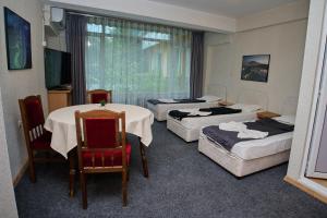 Triple Room room in Neon Guest Rooms