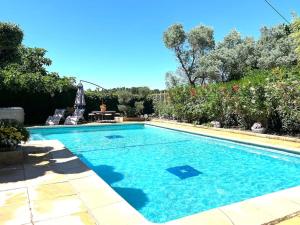 Appartements le jardin de mae : photos des chambres