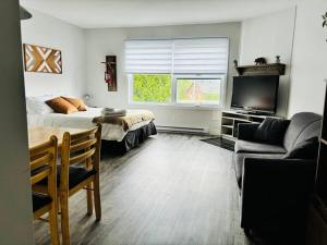Le petit loft chaleureux