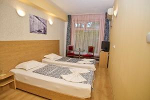 Twin Room room in Neon Guest Rooms