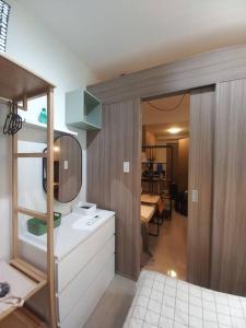 Modern Rustic 1-Bed Condo in MoA Complex