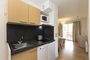 Villages vacances Residence Odalys Les Greens du Bassin : photos des chambres