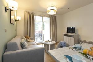 Villages vacances Residence Odalys Les Greens du Bassin : photos des chambres