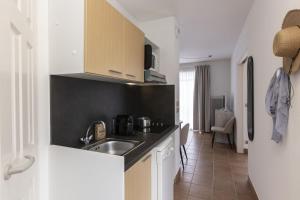 Villages vacances Residence Odalys Les Greens du Bassin : photos des chambres