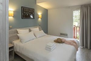 Villages vacances Residence Odalys Les Greens du Bassin : photos des chambres