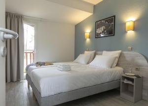 Villages vacances Residence Odalys Les Greens du Bassin : photos des chambres