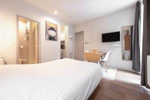 Appart'hotels Apparts de l'Oncle Louis : photos des chambres