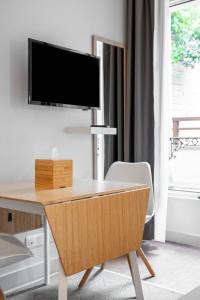 Appart'hotels Apparts de l'Oncle Louis : photos des chambres