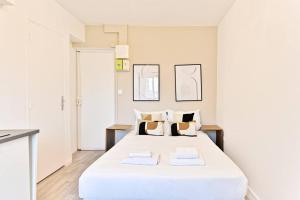 Appartements Petit Studio chaleureux en Banlieue - Asnieres : photos des chambres