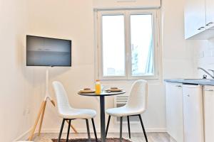 Appartements Petit Studio chaleureux en Banlieue - Asnieres : photos des chambres