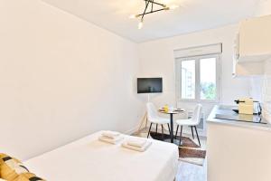 Appartements Petit Studio chaleureux en Banlieue - Asnieres : photos des chambres