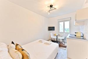 Appartements Petit Studio chaleureux en Banlieue - Asnieres : photos des chambres