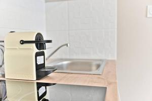 Appartements Petit studio equipee en banlieue Parisienne : photos des chambres