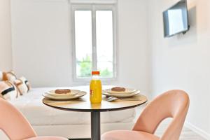 Appartements Petit studio equipee en banlieue Parisienne : photos des chambres