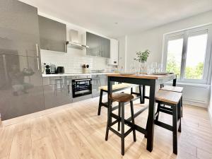Appartements Le Renouveau, neuf et tout equipe : photos des chambres