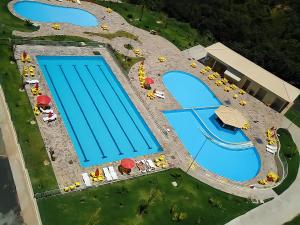 ÁGUAS TERMAIS NATURAIS nas PISCINAS com ÁGUAS QUENTES 24 HORAS acesso GRÁTIS aos PARQUES AQUÁTICOS dos RESORTS GOLDEN DOLPHIN GRAND HOTEL do SUPREME e do EXPRESS os melhores HOTÉIS RESORTS com PARQUE AQUÁTICO em CALDAS NOVAS Garanta JÁ PROMOÇ