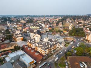 Campos de Canela 1 dorm na Rua Coberta by Achei