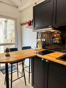 Suite romantique JACUZZI privatif chauffé à 37 GARE
