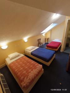 Maisons d'hotes Chambre chez Marie et Didier 1 minute a pied du sanctuaire de Lourdes : photos des chambres
