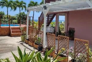 La Canopée - Appartement F2 avec piscine - vue mer - 勒罗贝尔