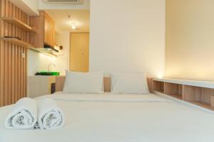 Comfy and Best Deal Studio at Tokyo Riverside PIK 2 Apartment By Travelio