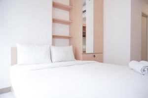 Homey and Simply Studio at Tokyo Riverside PIK 2 Apartment By Travelio