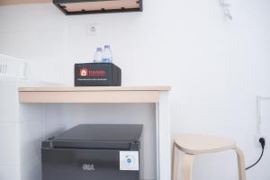 Homey and Simply Studio at Tokyo Riverside PIK 2 Apartment By Travelio