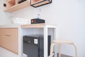 Homey and Simply Studio at Tokyo Riverside PIK 2 Apartment By Travelio