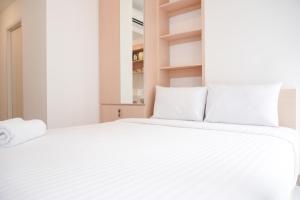 Warm and Simply Studio at Tokyo Riverside PIK 2 Apartment By Travelio