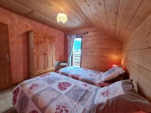 Maisons de vacances Chalet chaleureux face aux pistes, proche Gerardmer, ideal pour famille, balcon et terrasse - FR-1-589-182 : photos des chambres