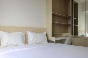 Restful and Cozy 2BR Tokyo Riverside PIK 2 Apartment By Travelio