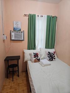 Mels Place Batangas City Unit 1 Two-Bedroom House w Free Parking, WIFI 4 adults & kids