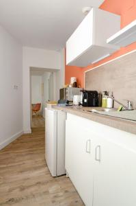 Appartements Le Petit Pasteur - Appartement design avec Sauna : photos des chambres