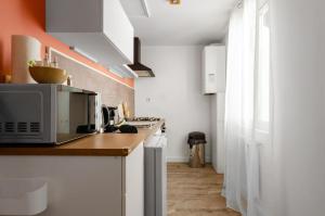 Appartements Le Petit Pasteur - Appartement design avec Sauna : photos des chambres